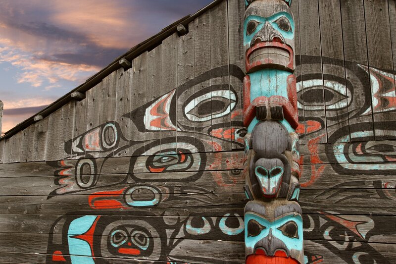 Totem pole and painted wall