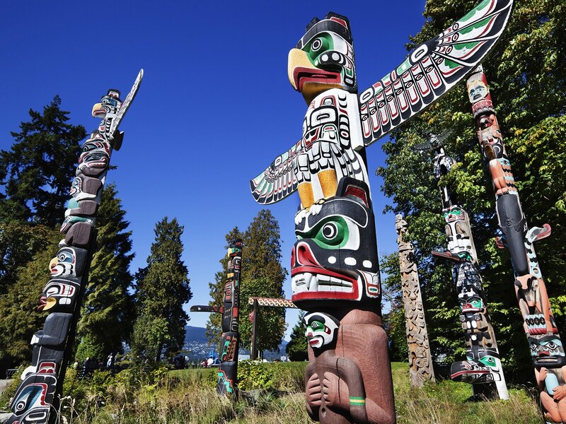 Totem Poles in Park — Blue