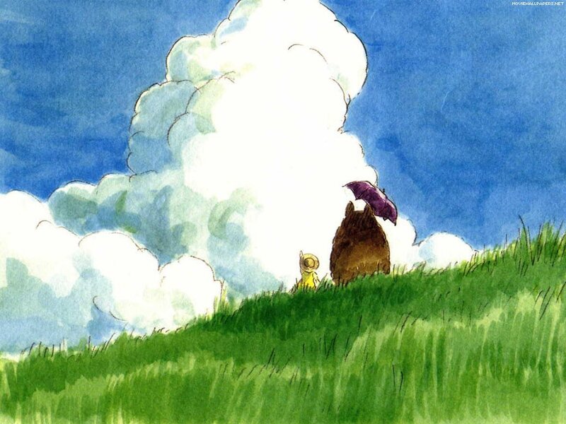 Totoro and child on a hill
