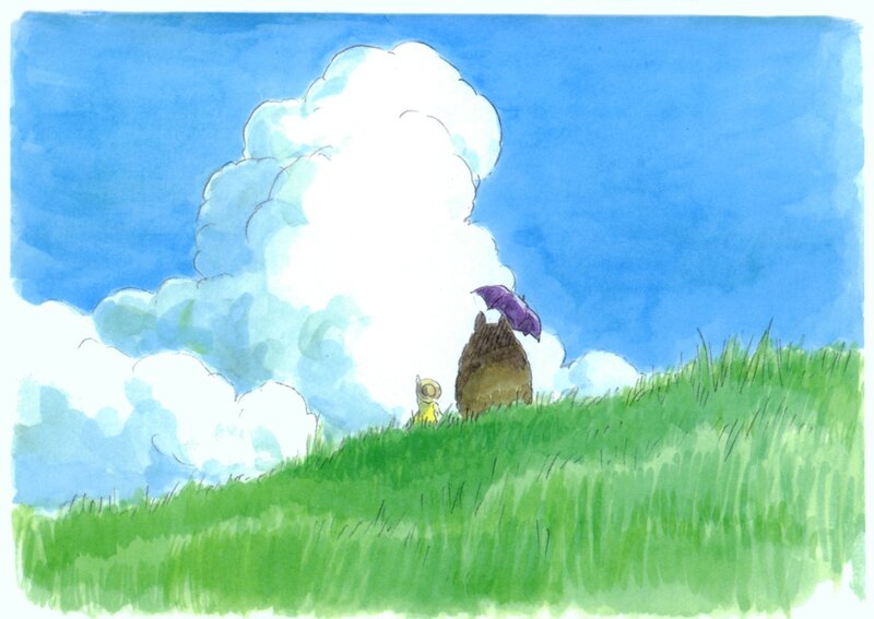 Totoro and child on a hill