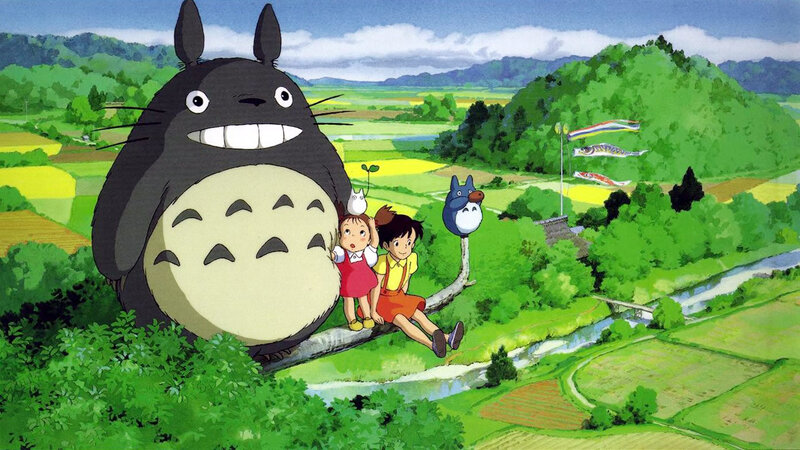 Totoro and children in a field