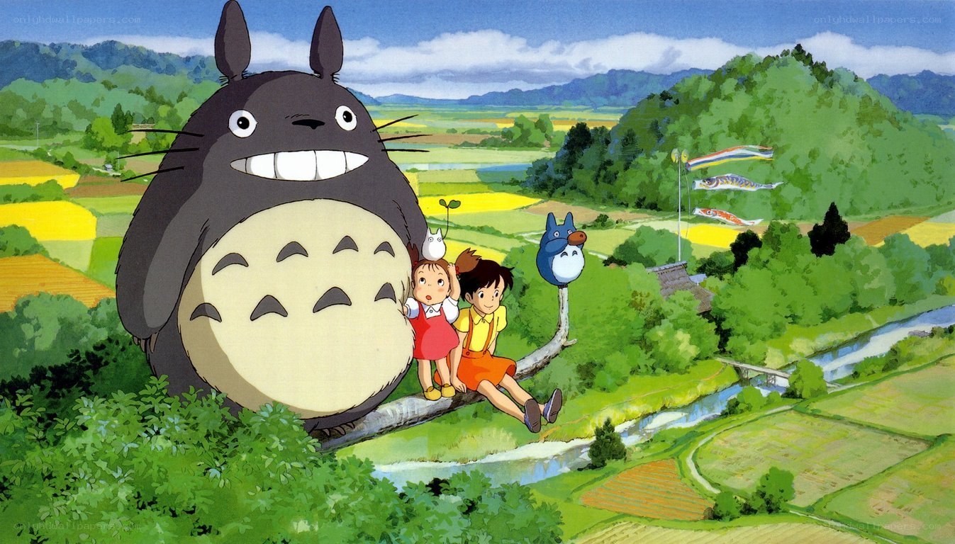 Totoro and children in a field