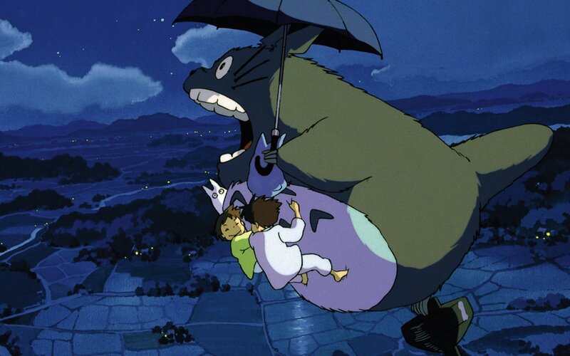 Totoro flies with children at night