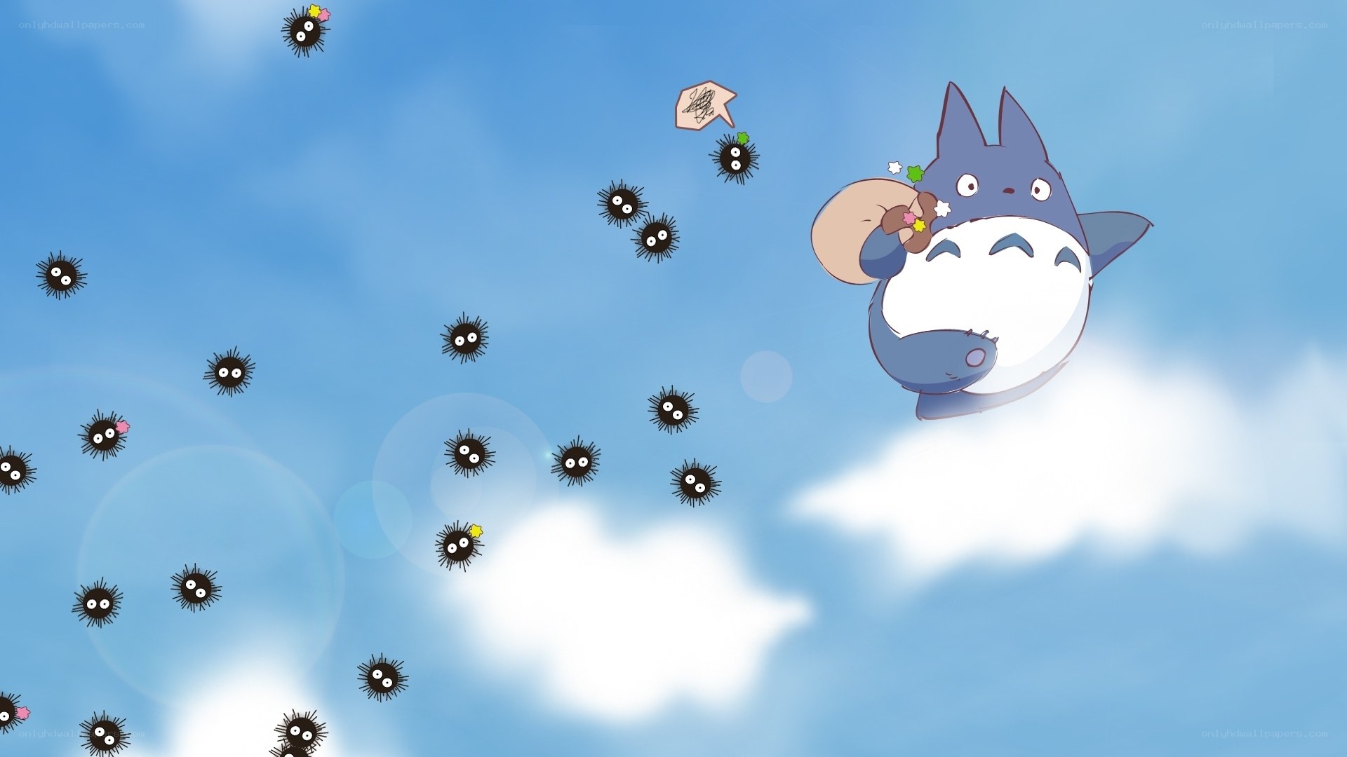 Totoro flying with soot sprites