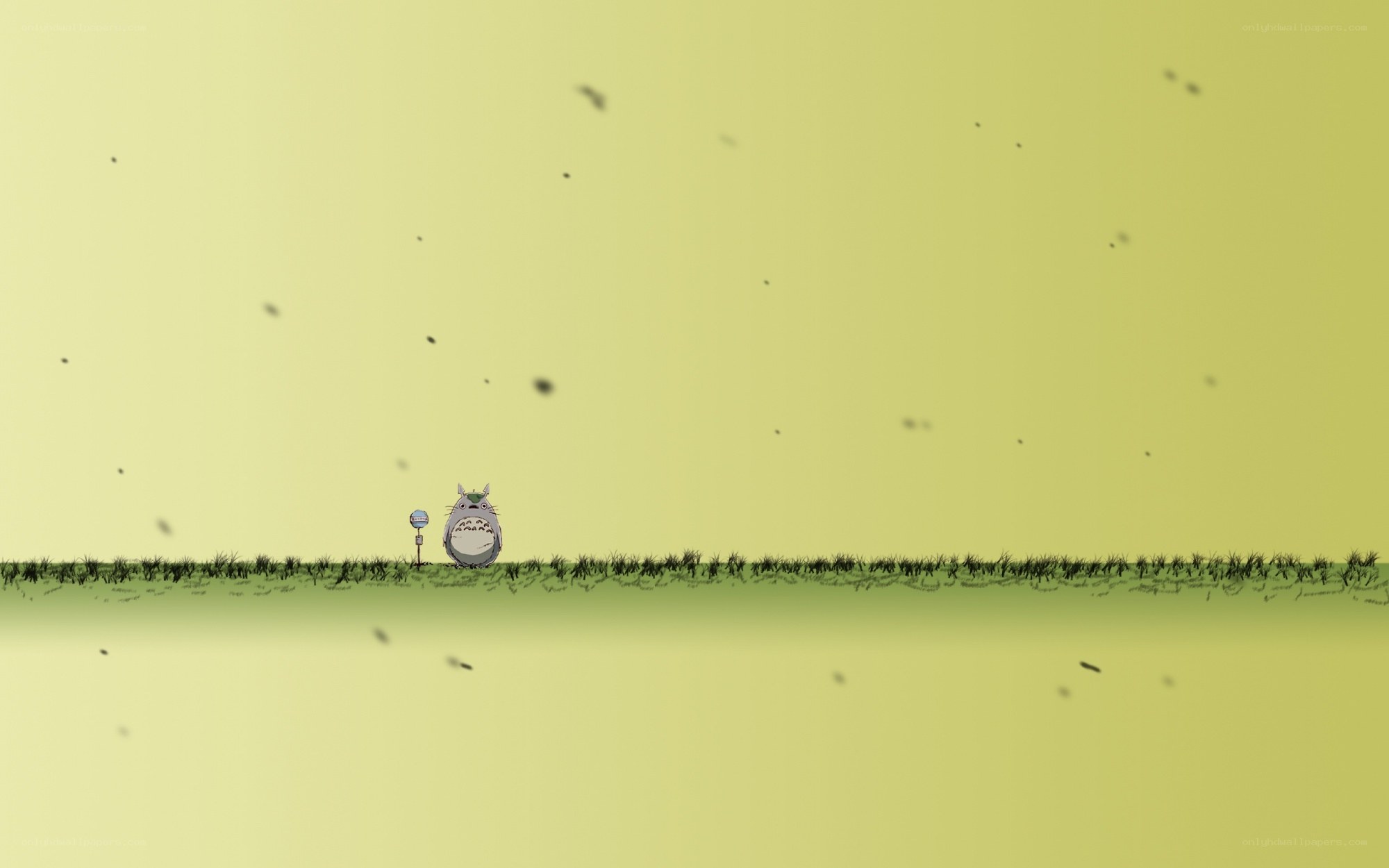 Totoro in a yellow field