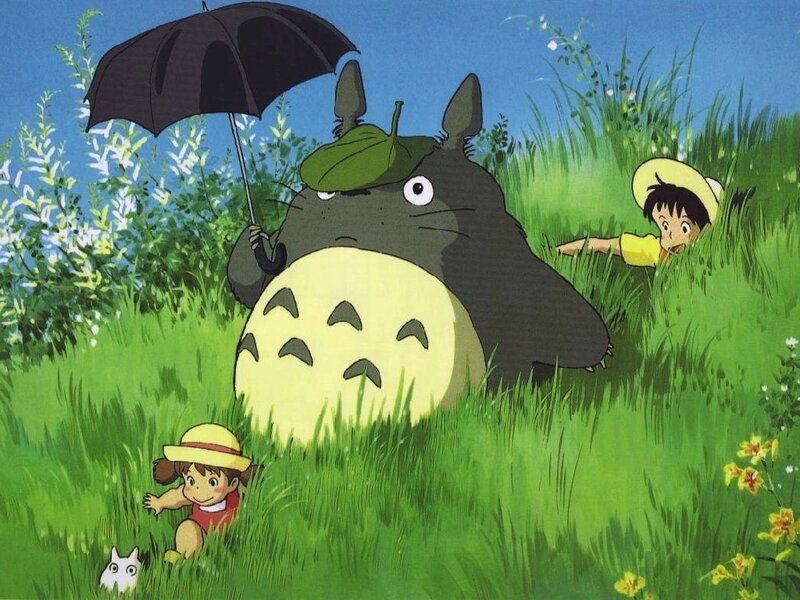 Totoro with children in a field