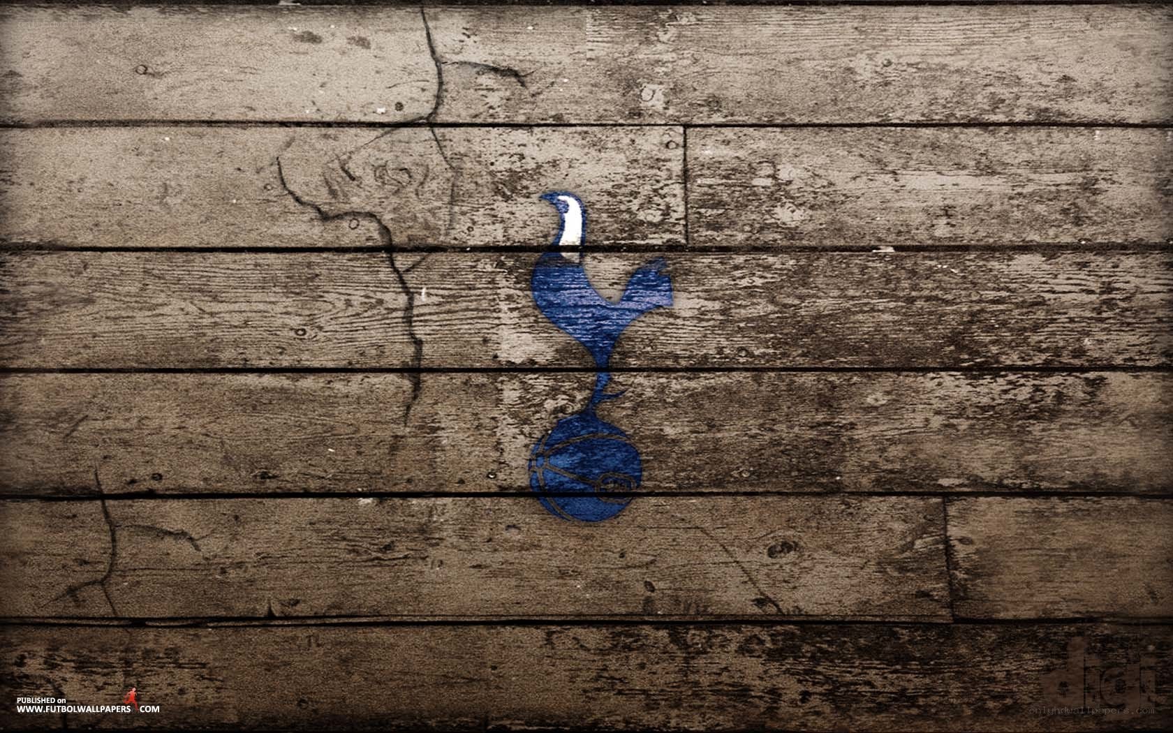 Tottenham Hotspur logo on wood