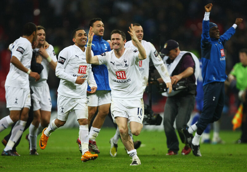 Tottenham players celebrate on field