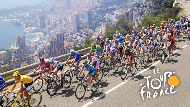 Tour de France cyclists on a climb