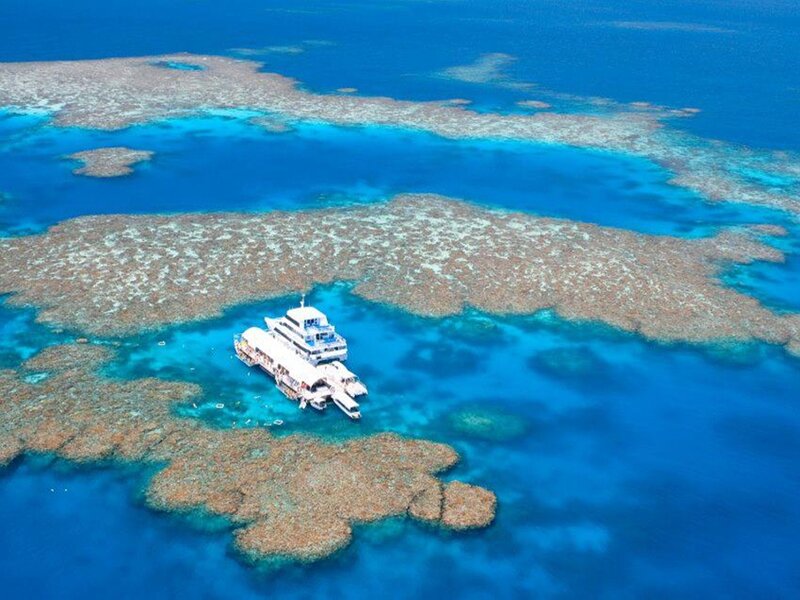 Tourist Boat Near Coral Reef