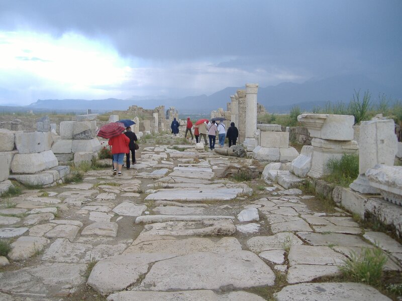Tourists at Ancient Ruins — Gray