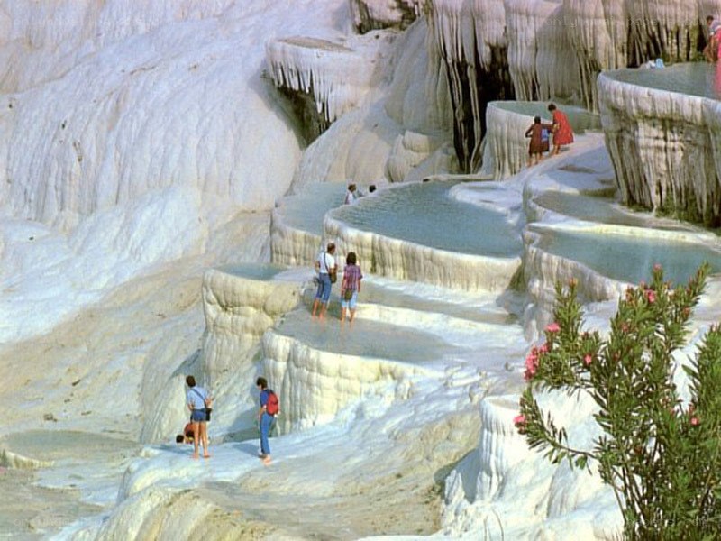 Tourists at travertine terraces