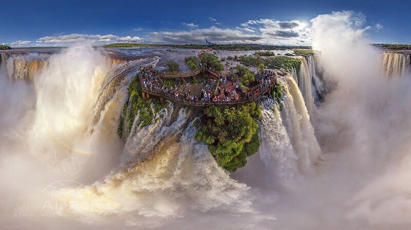 Tourists at Waterfall — Blue