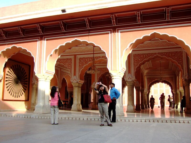 Tourists in Courtyard — Orange