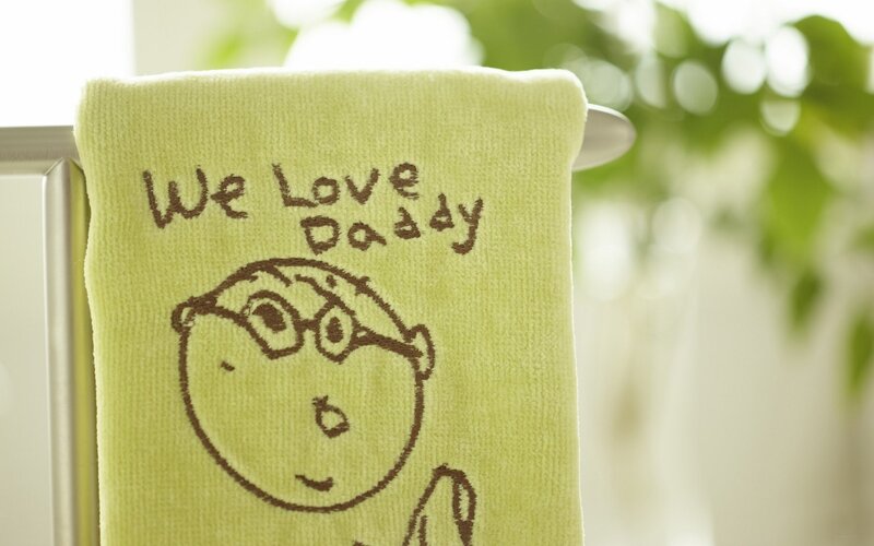 Towel with 'We Love Daddy' design
