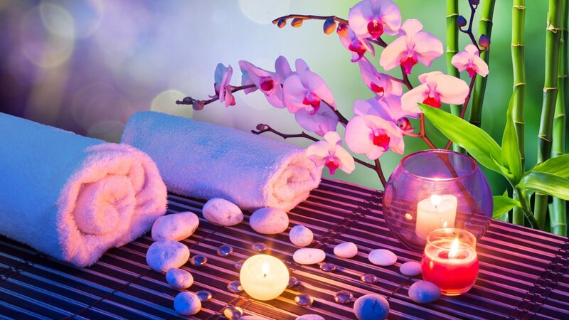 Towels and Candles on Mat