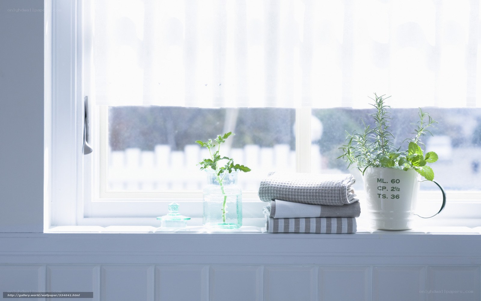 Towels and plants on a windowsill