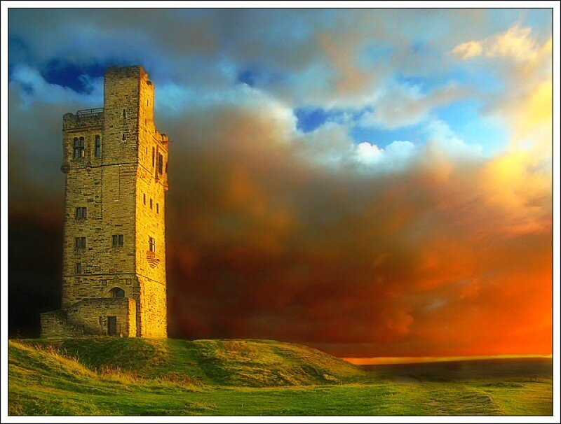 Tower at sunset on a hill
