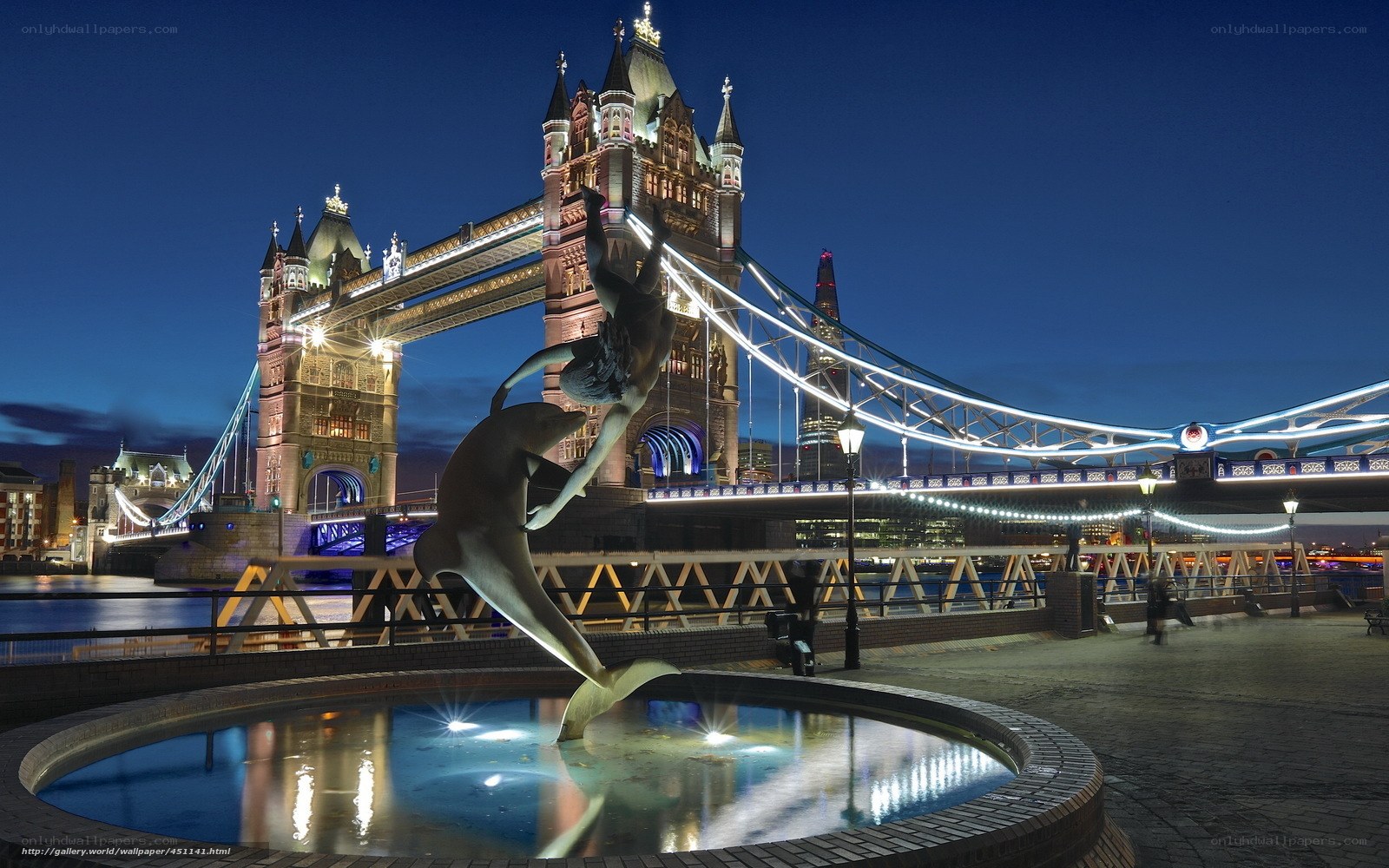 Tower Bridge at night with sculpture