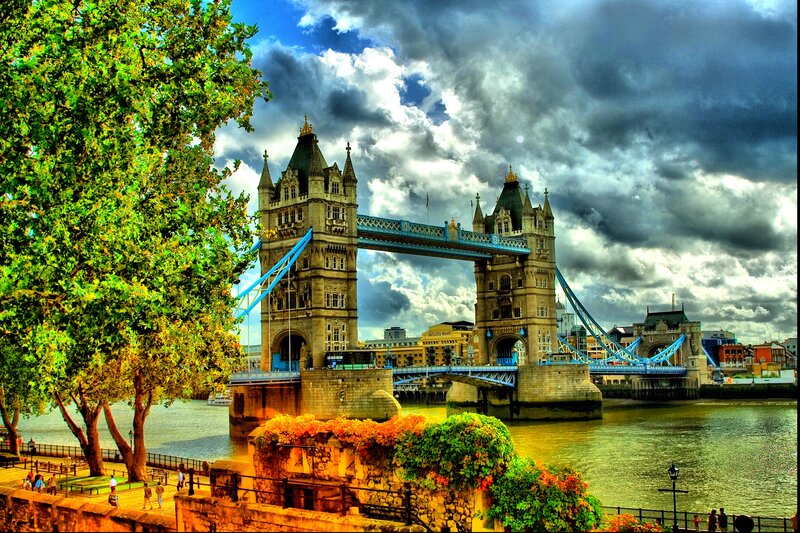 Tower Bridge in London — Blue, Dramatic, Afternoon, Photograph, River Thames, Cloudy Sky, Trees