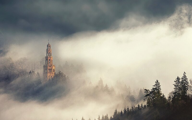 Tower in Foggy Forest