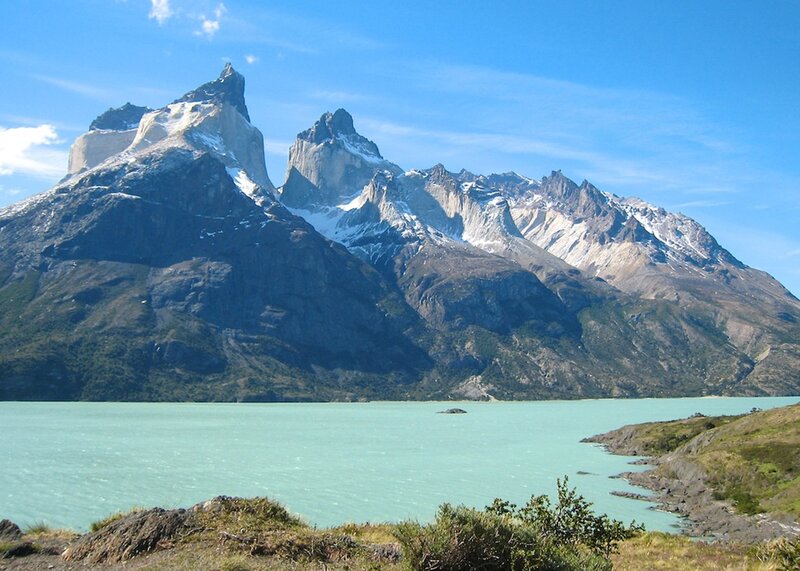 Towering peaks over turquoise lake