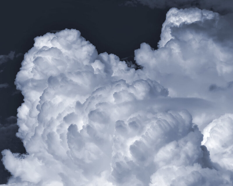 towering storm clouds