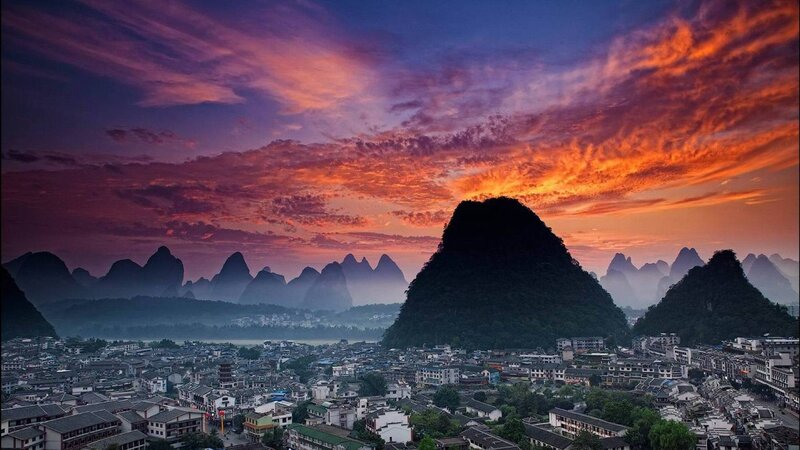 Town at Sunset — Orange, Dramatic, Photograph, Mountains