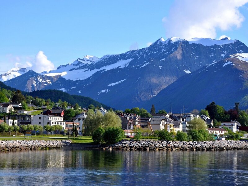 Town by Fjord with Mountains
