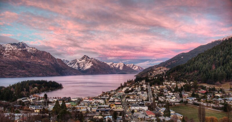 Town by lake at sunset