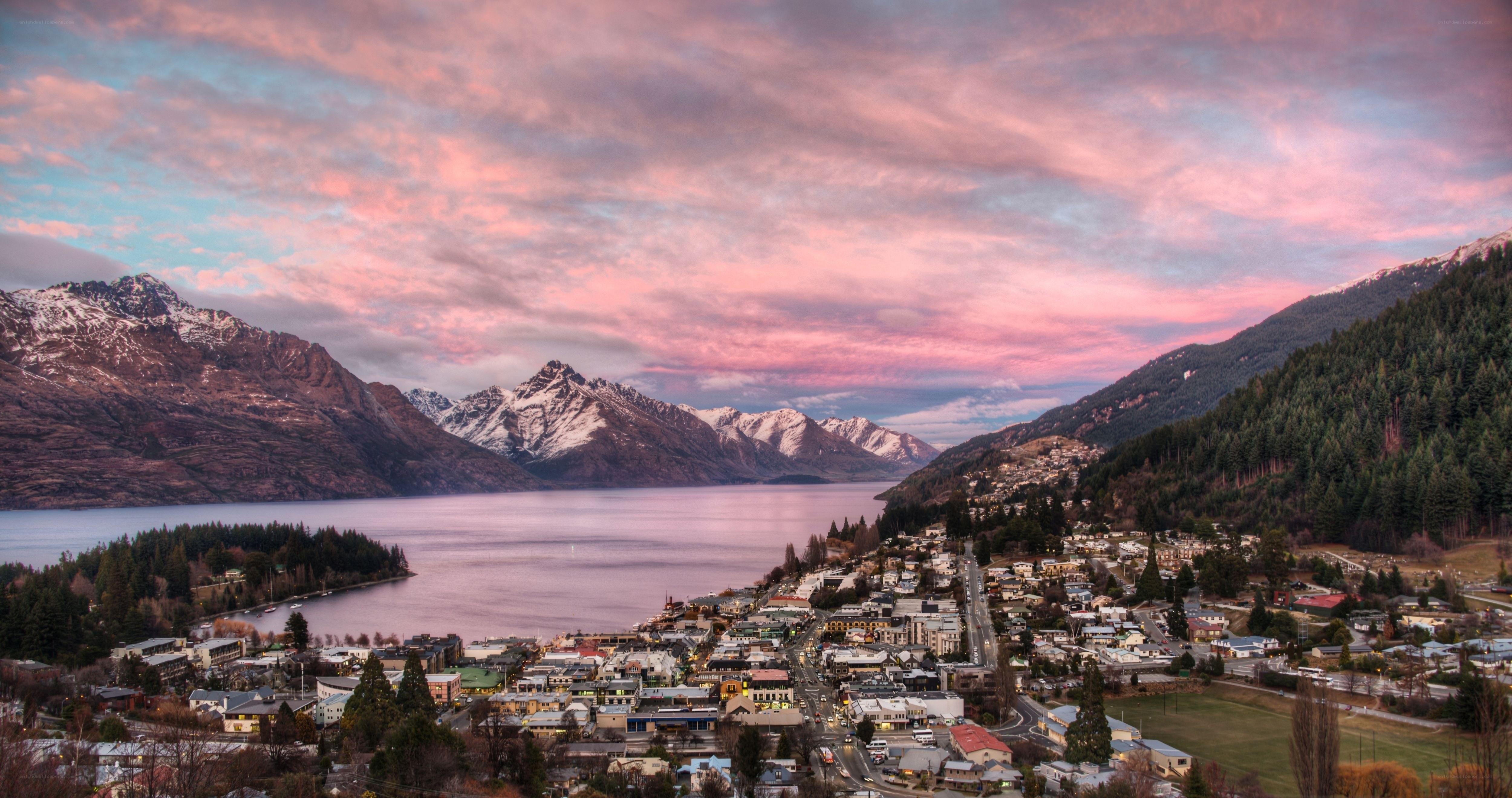 Town by lake at sunset