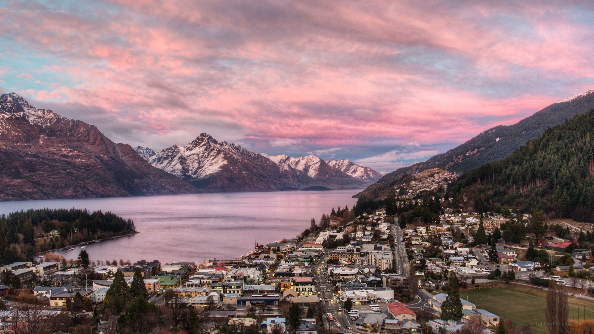 Town by lake at sunset
