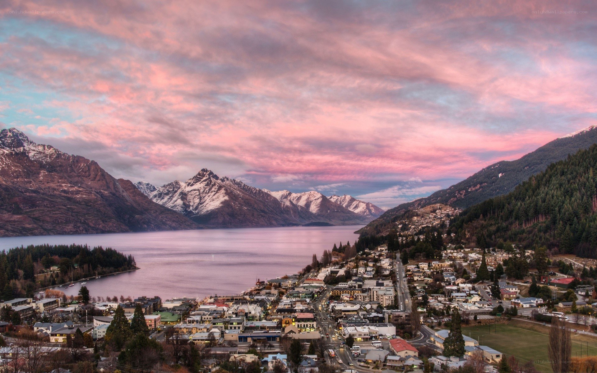 Town by lake at sunset