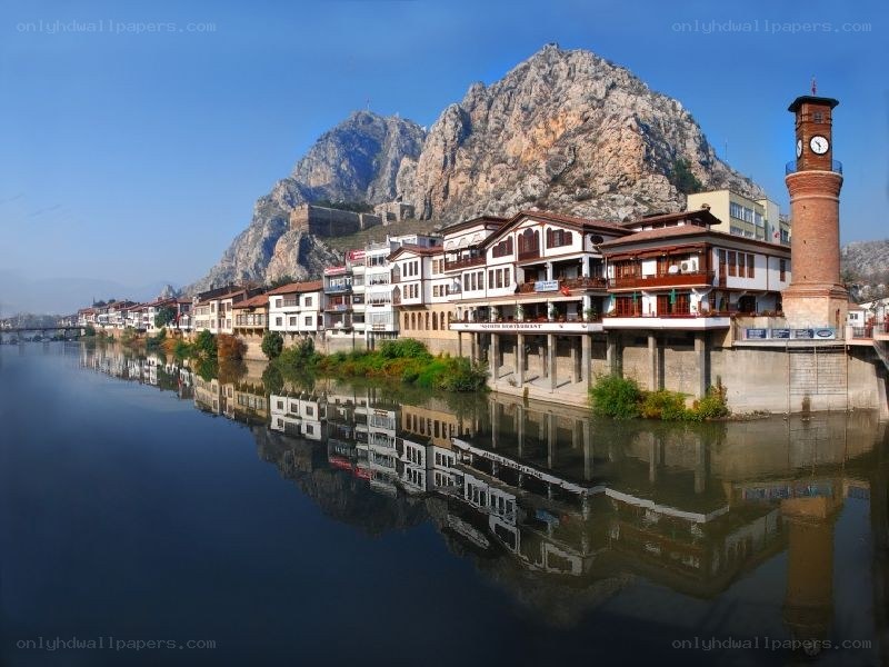 Town by the river with mountain