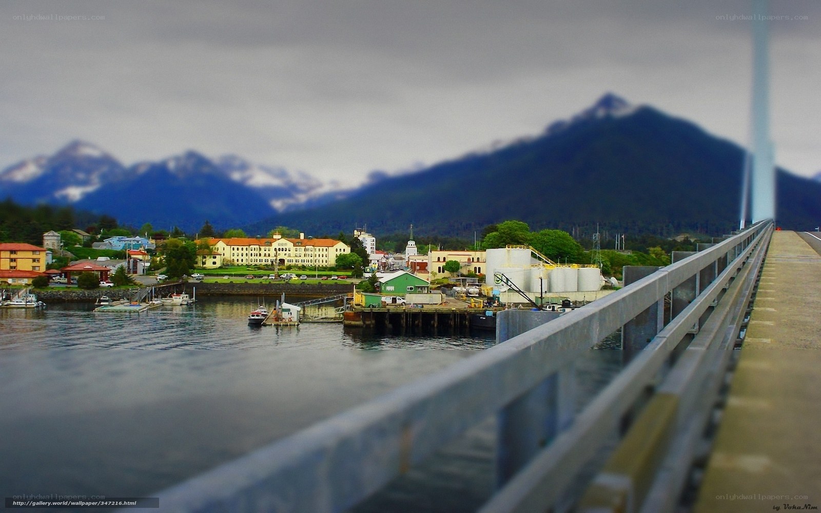 Town by the water with mountains