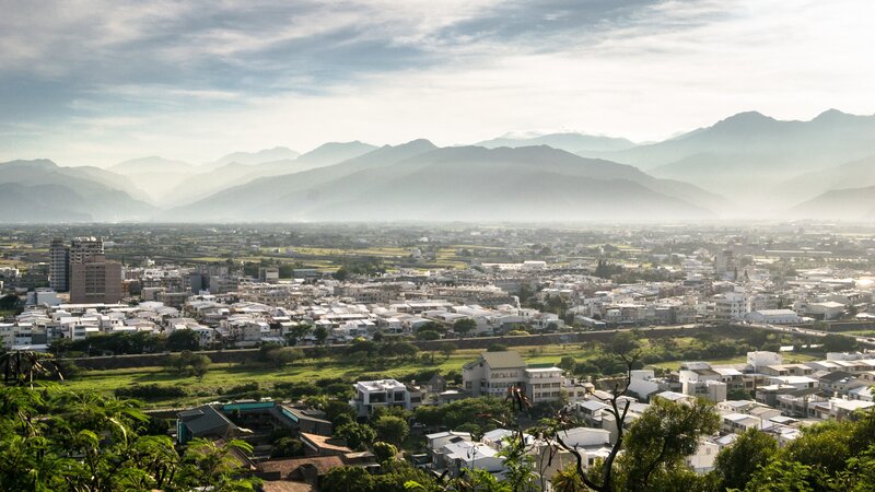 Town in Valley with Mountains