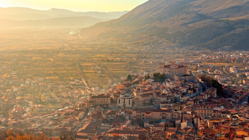 Town on a Hill at Sunset