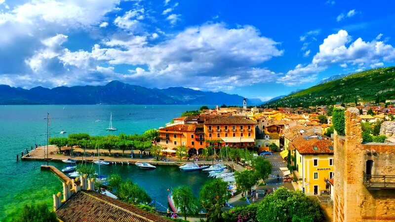 Town on Lake Shore — Blue, Serene, Afternoon, Photograph, Mountains, Boats