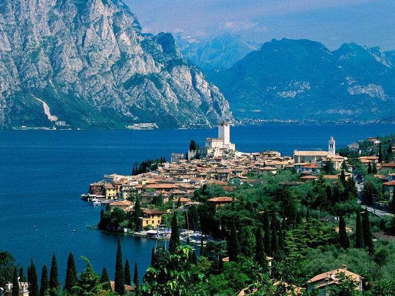 Town on Lake Shore — Blue, Serene, Afternoon, Photograph, Mountains, Buildings