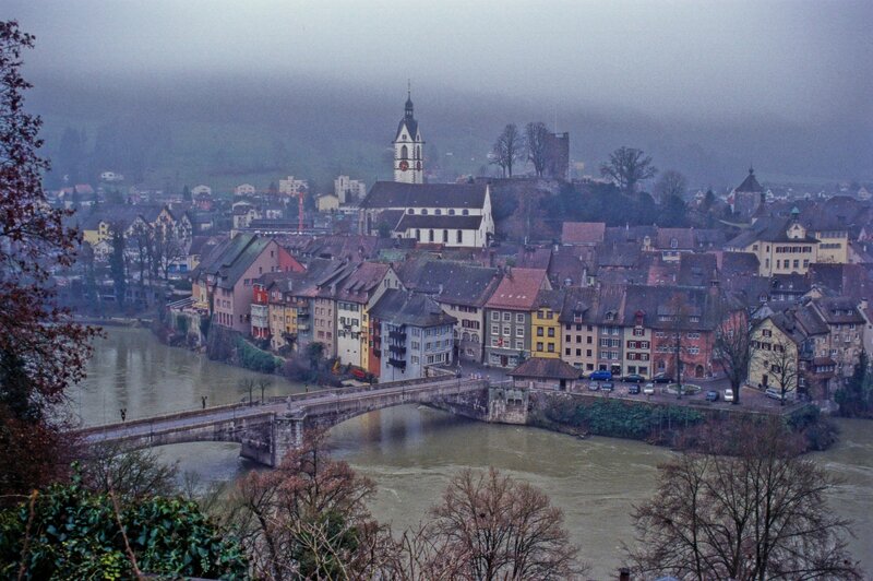 Town on Riverbank — Gray