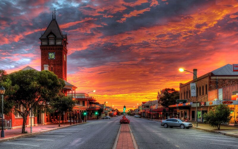 Town Street at Sunset — Orange, Dramatic
