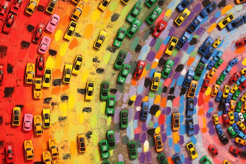 Toy Cars on Painted Surface