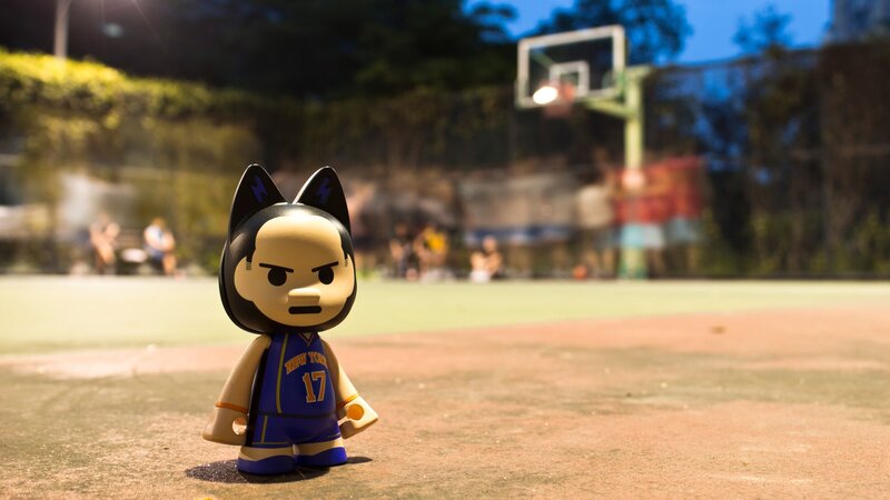 Toy figure on basketball court