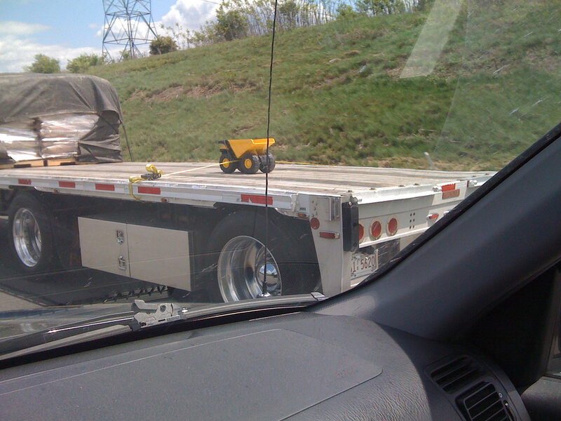 Toy truck on flatbed trailer