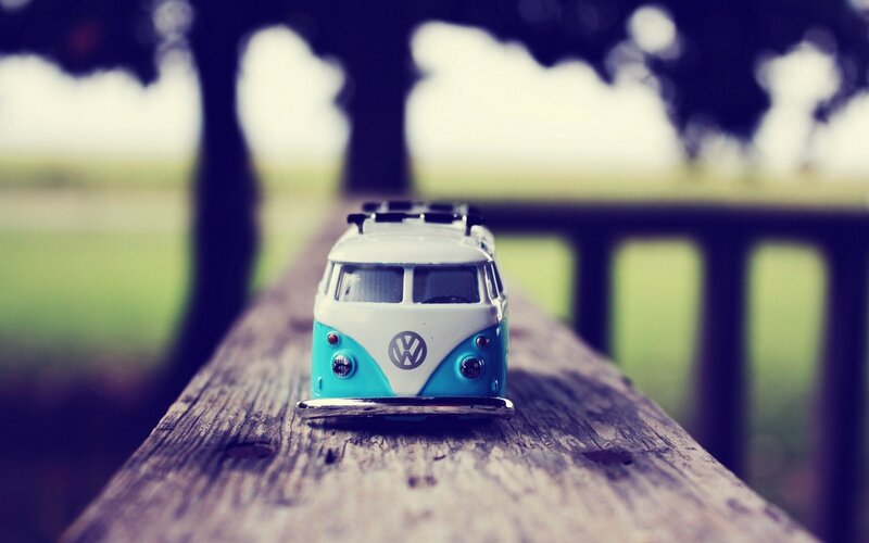 Toy van on wooden bench