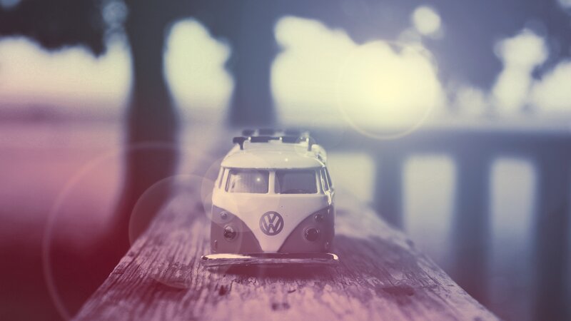 Toy Van on Wooden Surface — White