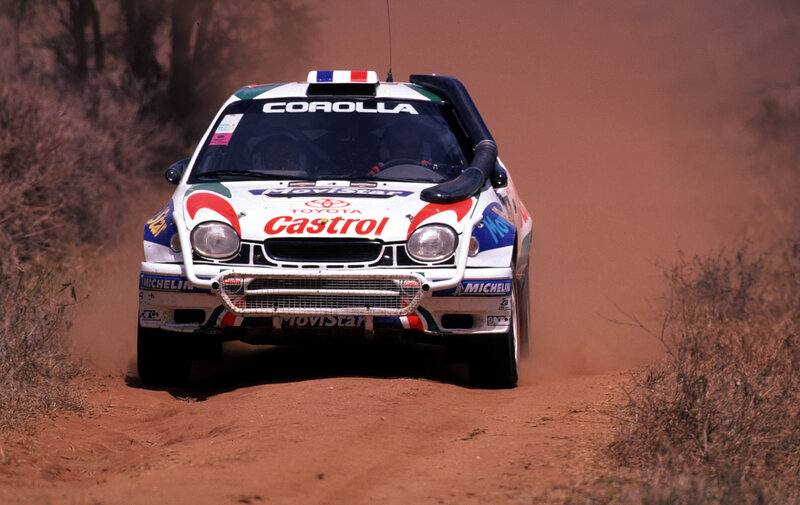 Toyota Corolla rally car on dirt road