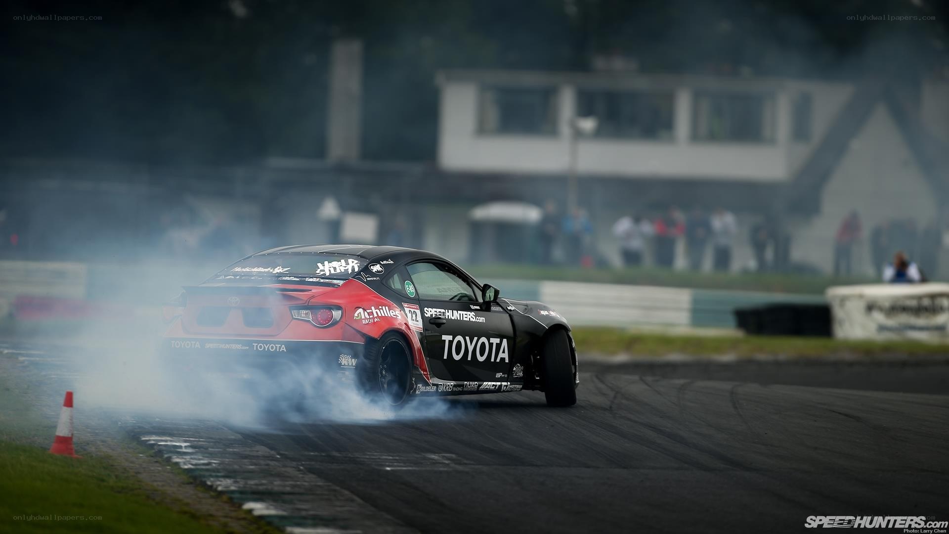 Toyota drifting on a racetrack