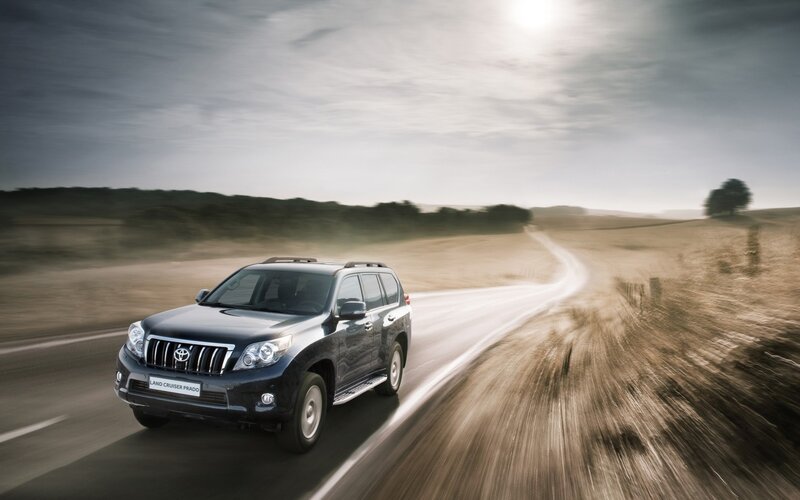 Toyota Land Cruiser Prado on country road