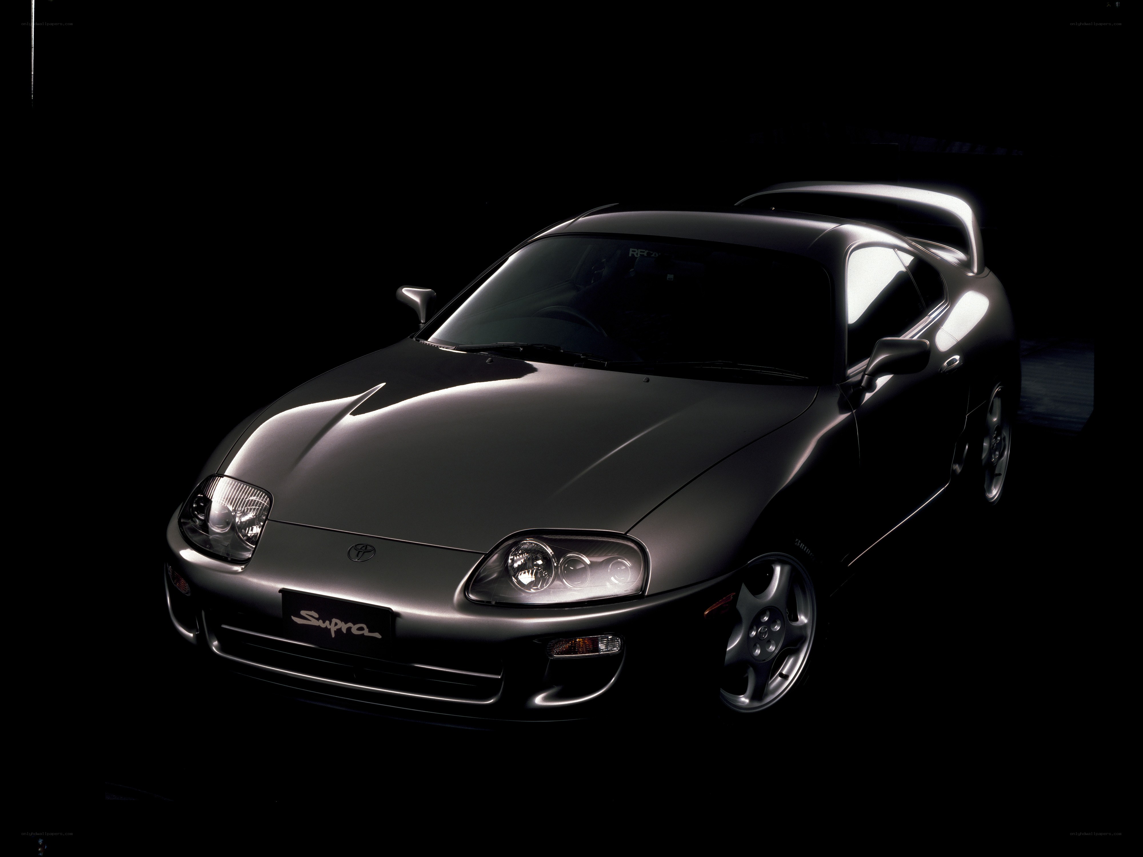 Toyota Supra in dark studio
